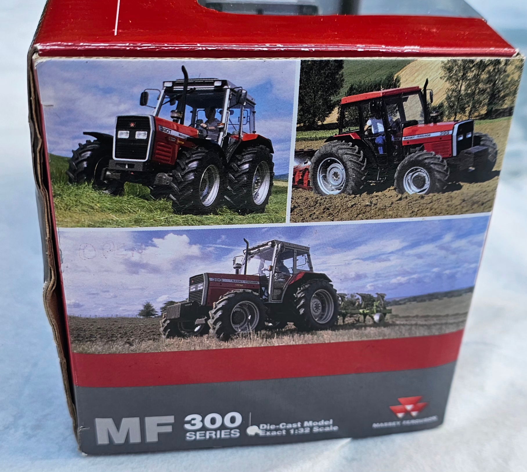 Universal Hobbies Massey Ferguson MF 390 4WD Tractor