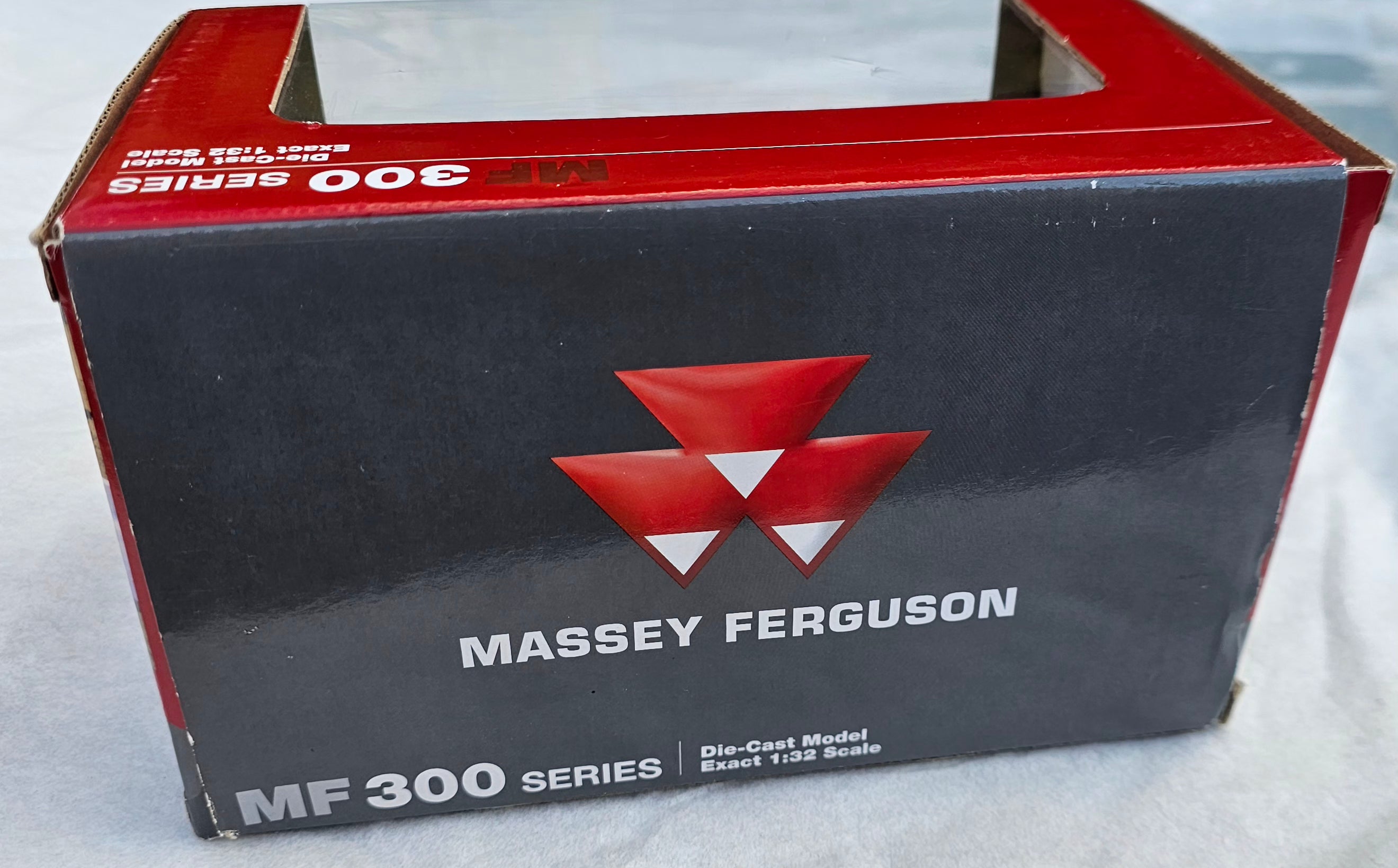 Universal Hobbies Massey Ferguson MF 390 2WD Tractor