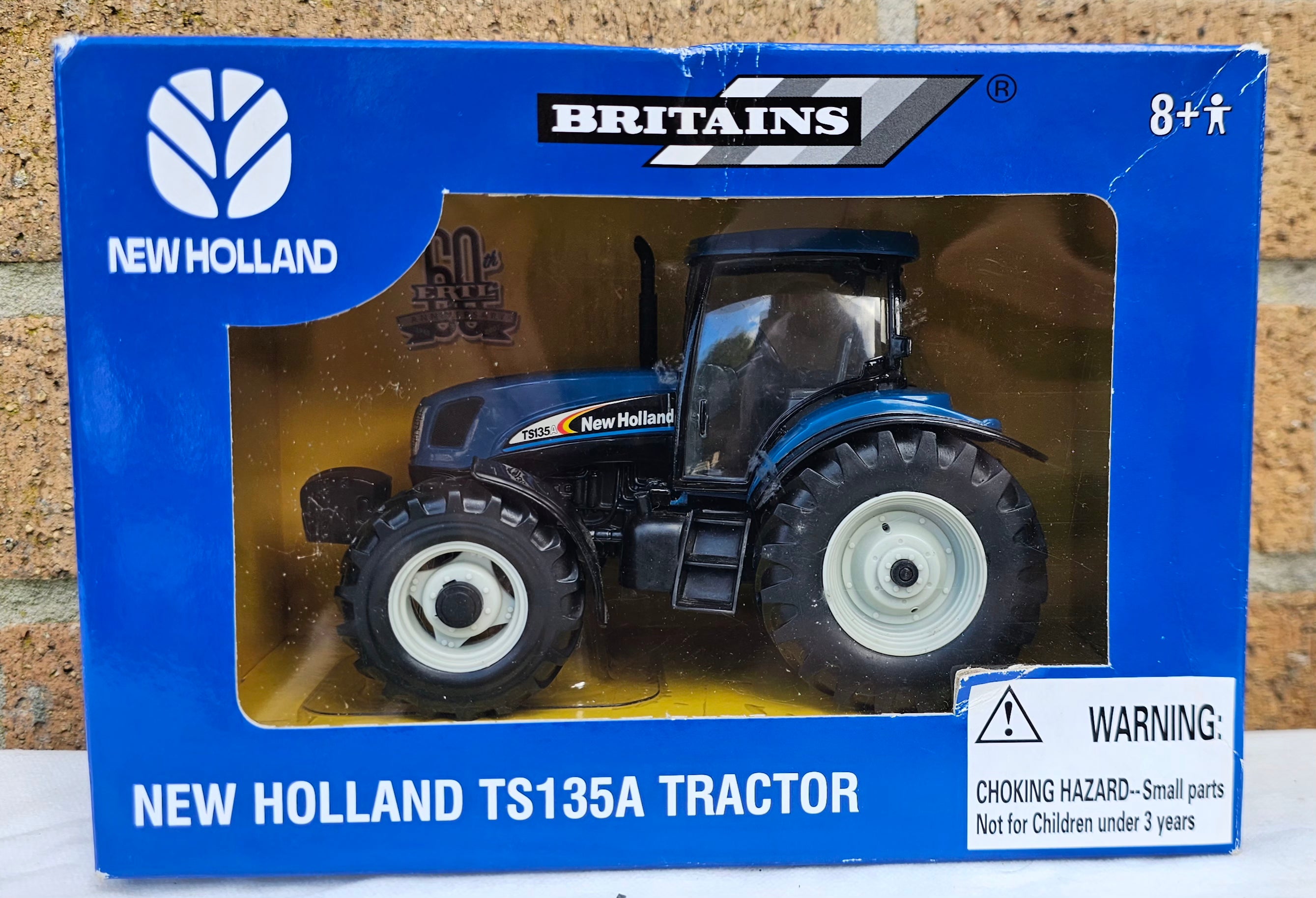 Britains New Holland TS135A Tractor Dealer Box 42098B